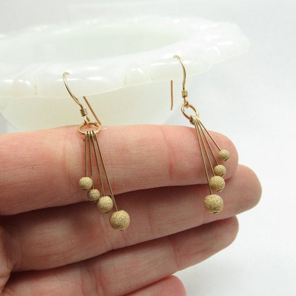 Gold Stardust Dangle earrings - Picture 1 of 5
